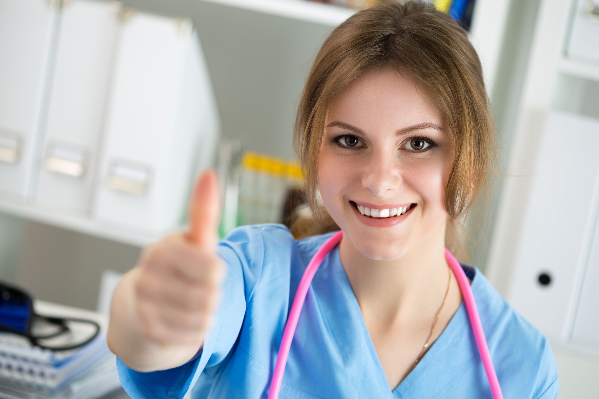 Medical Assistant giving a thumbs-up sign