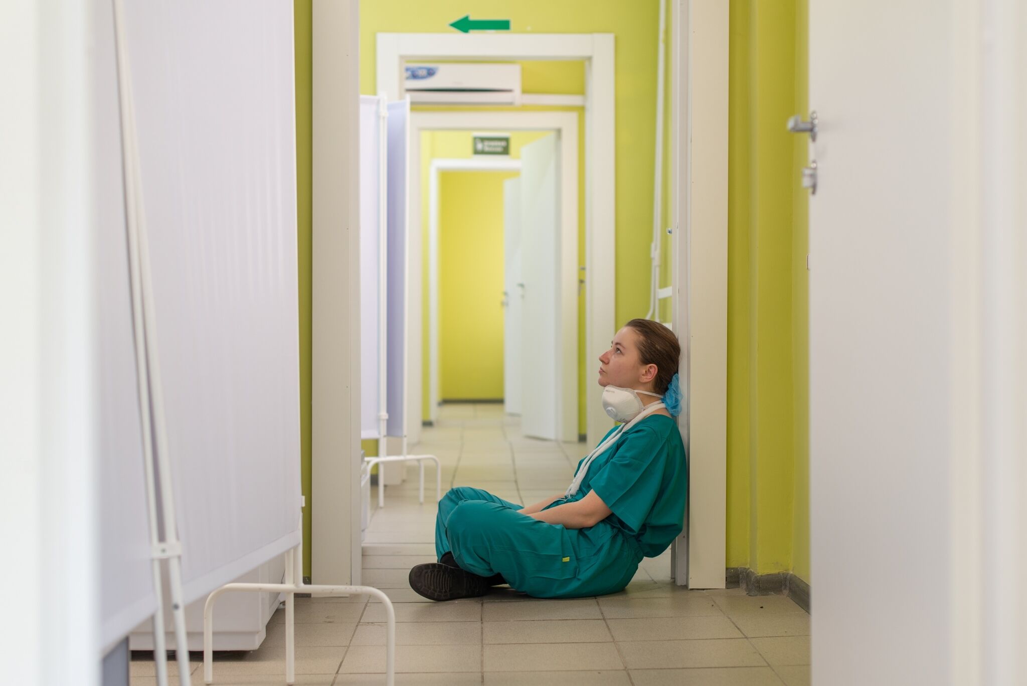 Nurse sitting in a hallway