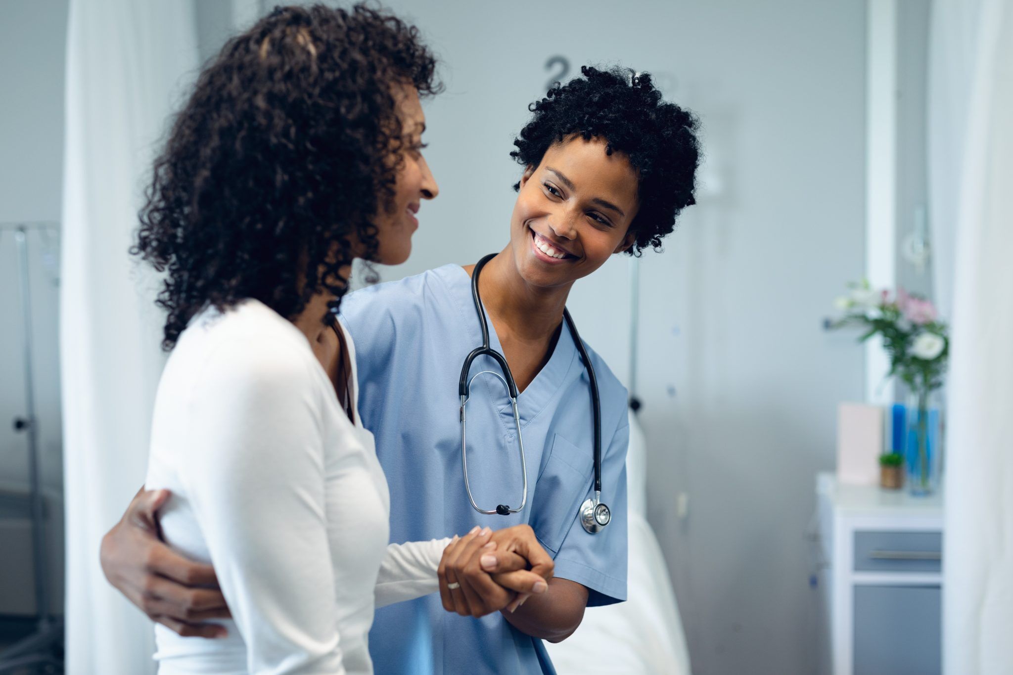 Young healthcare professional assisting a patient