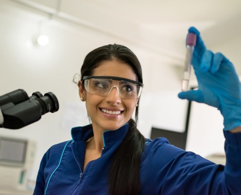 Healthcare professional holding a lab sample