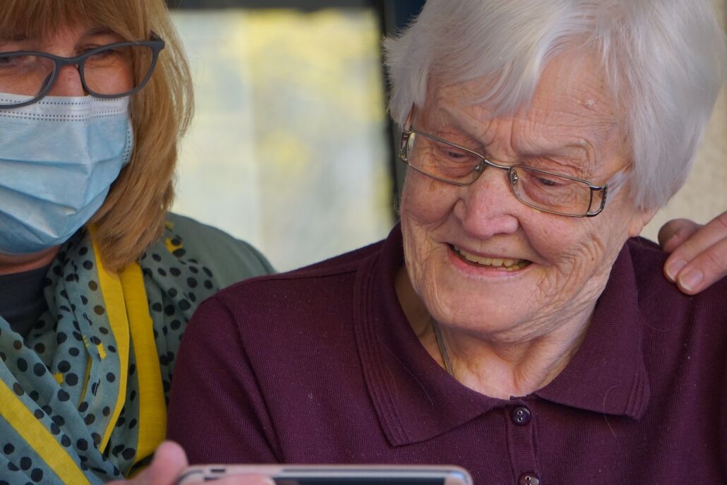 Nurse helping elderly patient