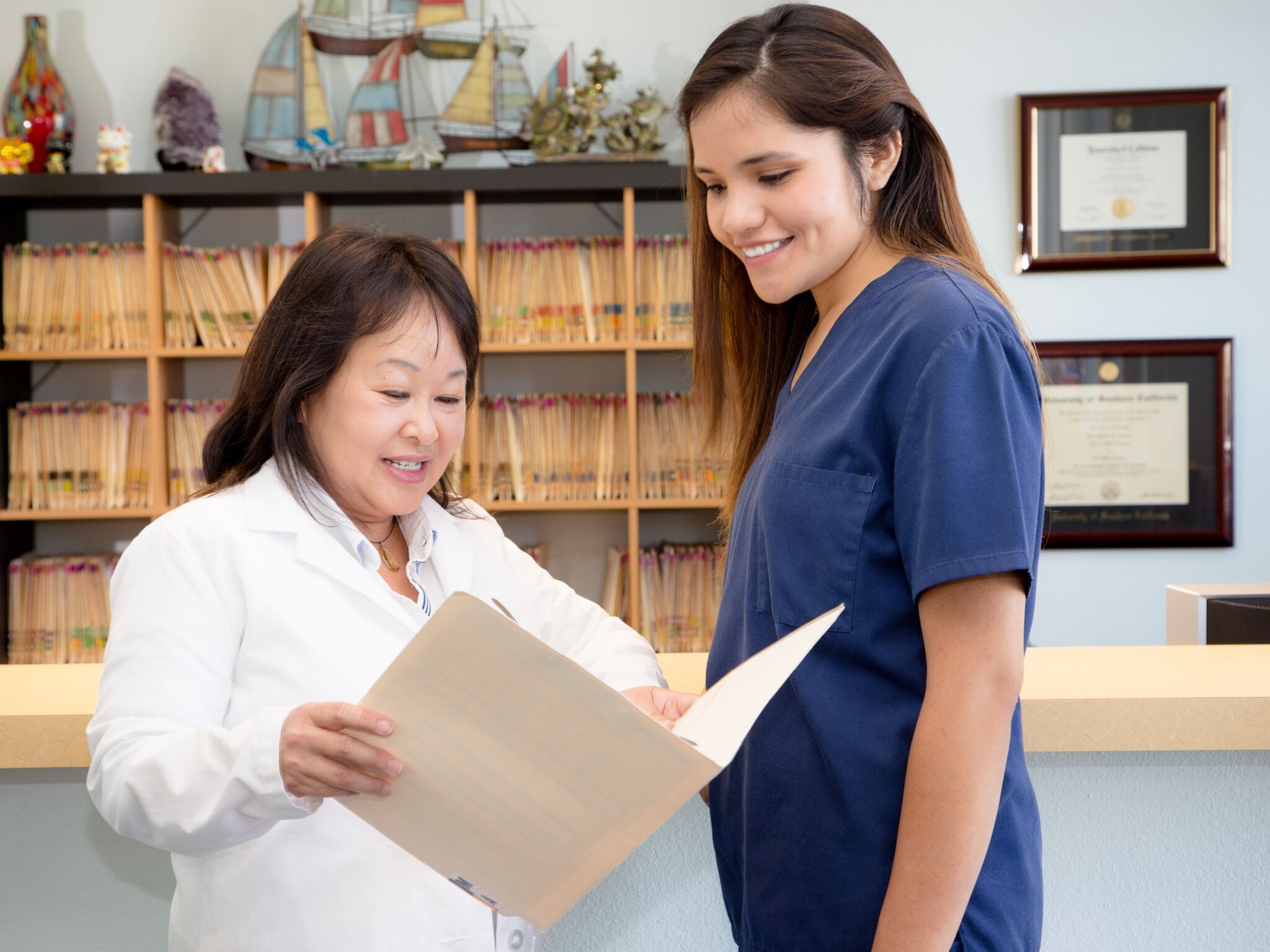 Healthcare team discussing a patient's chart