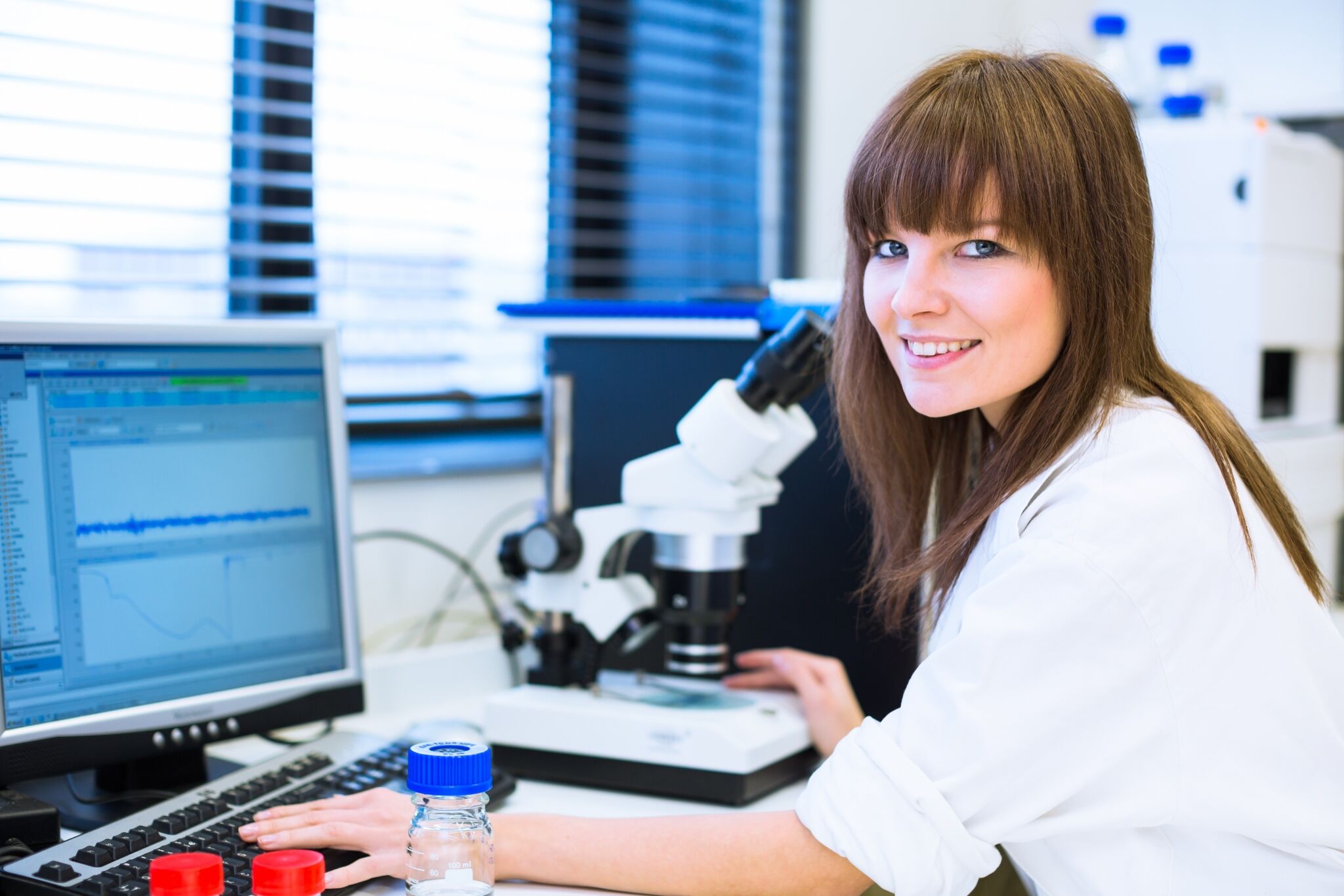 Female professional with lab equipment