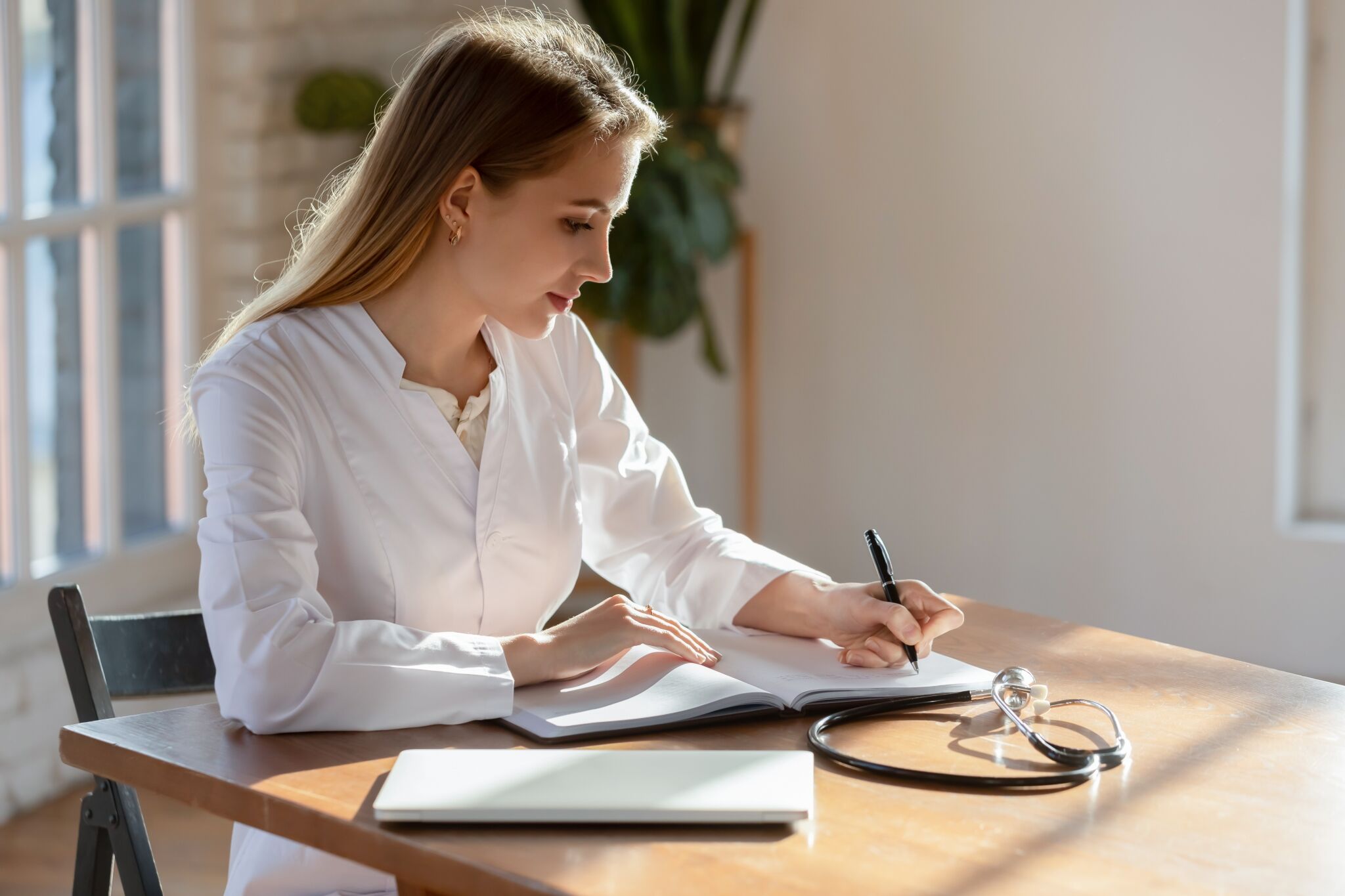 Medical professional completing paperwork