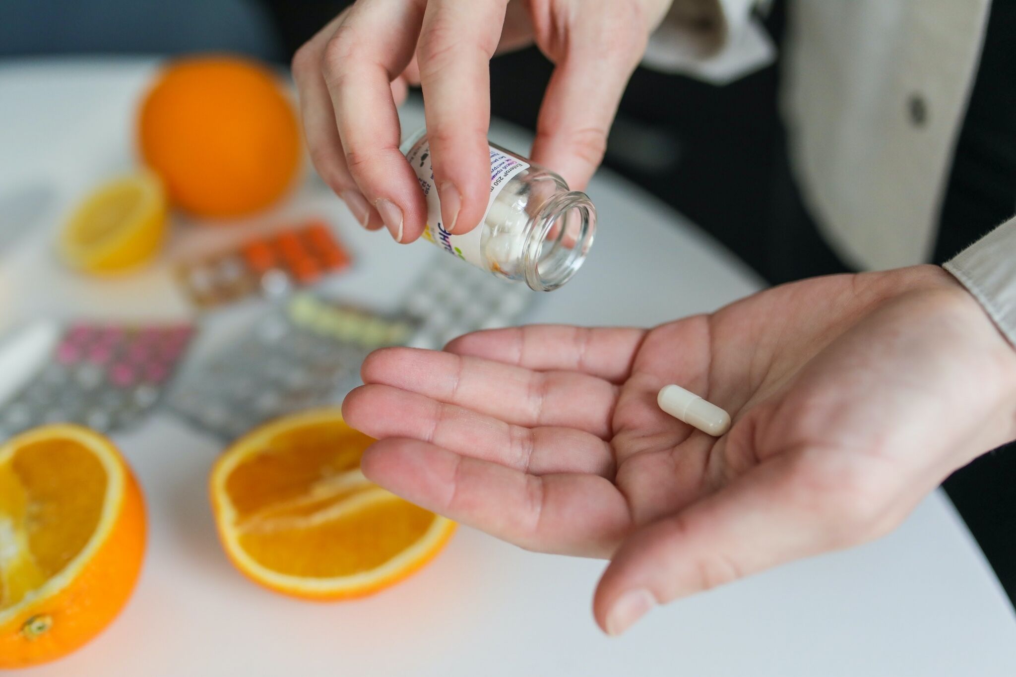 Pouring pills from a bottle