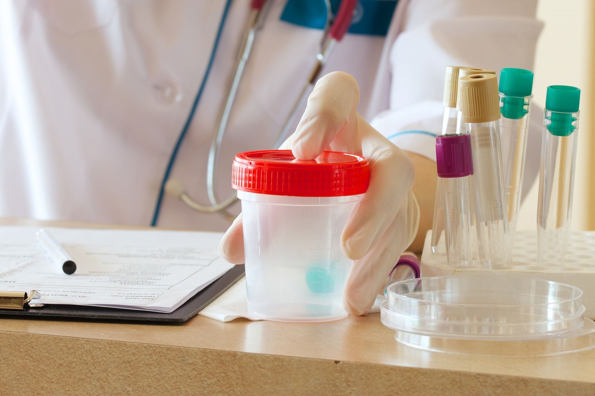 Medical professional collecting specimens