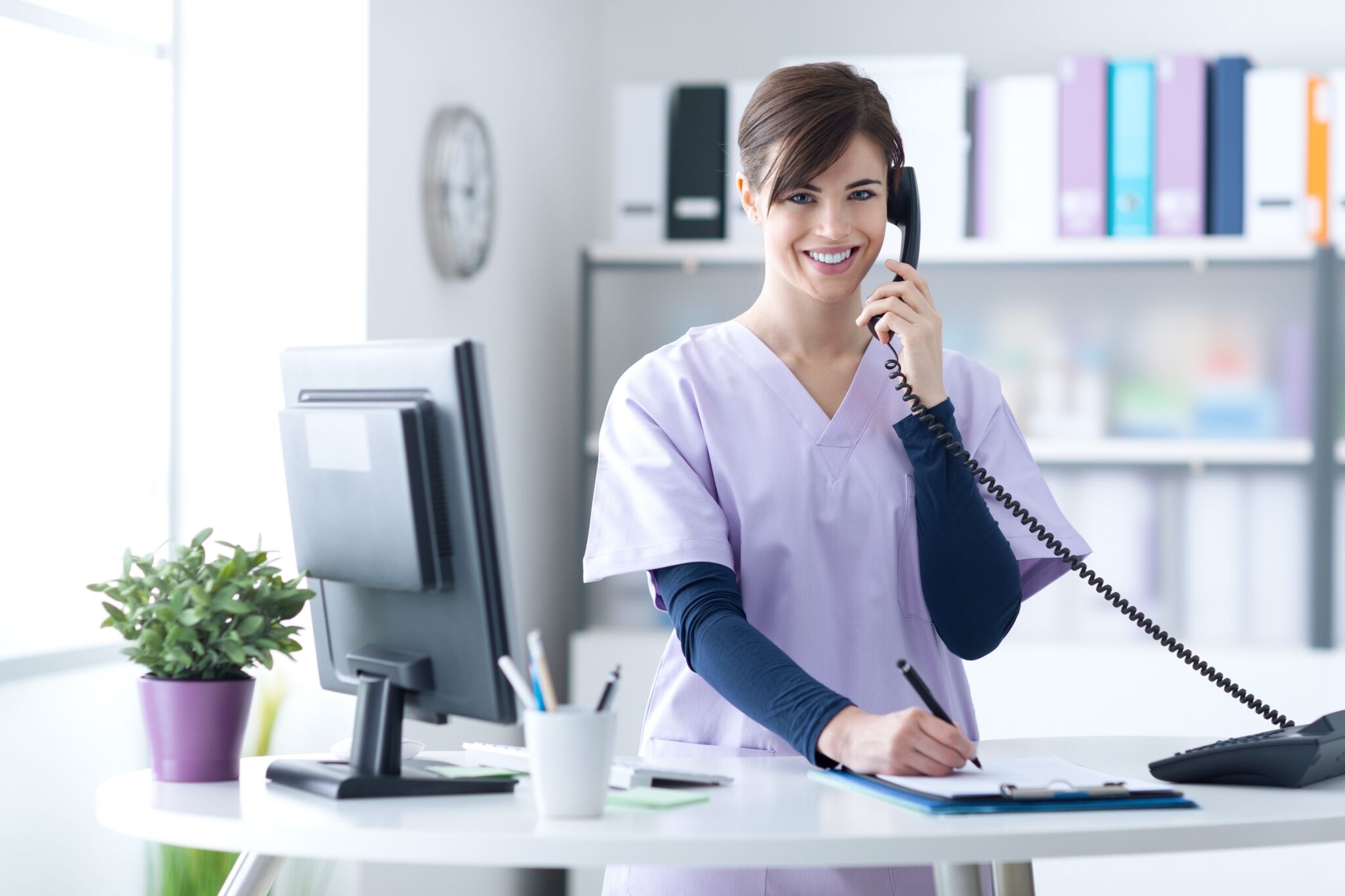 Young medical practitioner on the phone