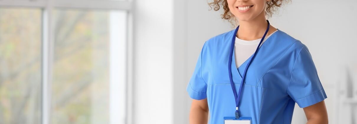 Young african-american nurse in scrubs