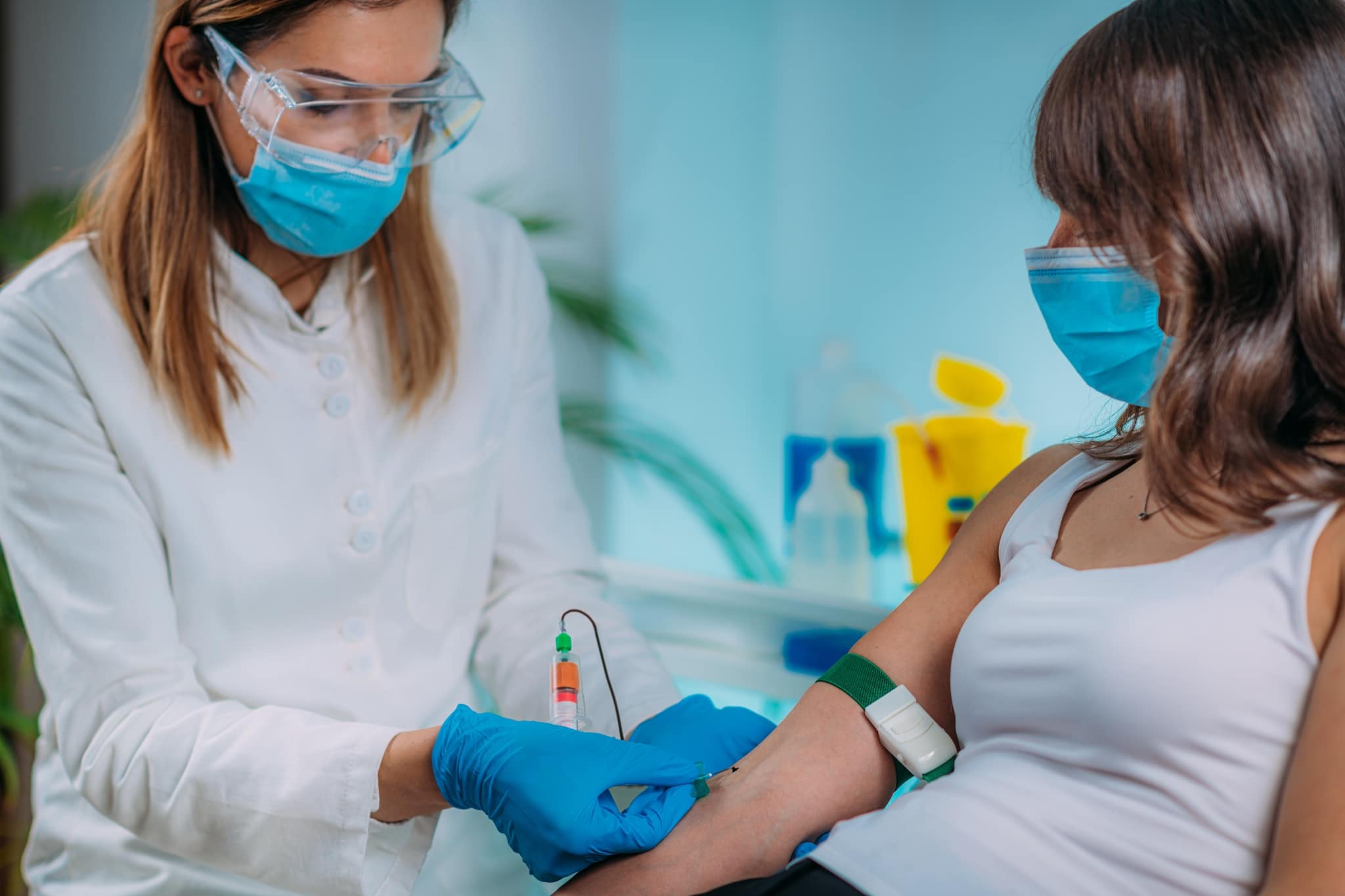 Medical worker taking a blood sample