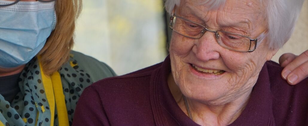 Nurse helping elderly patient